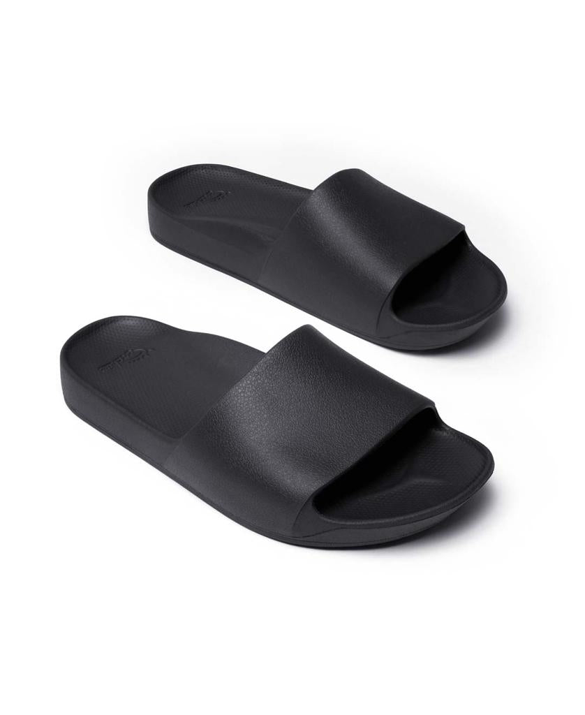 The Archies Archie Slide | Black features thick straps and textured footbeds, crafted from durable closed cell foam, shown on a white background.