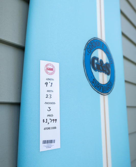 The G&S 91 Hotdogger Matte Finish longboard by Gordon & Smith in blue measures 91 x 23 x 3, designed for performance and manoeuvrability. Price: $1,799.