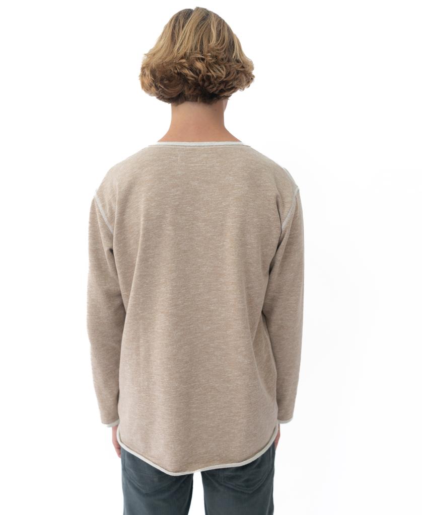 Person with short, wavy blond hair wears the Golden Breed Classic Rag Top in Coffee Marle and jeans, shown from the back against a plain white background.