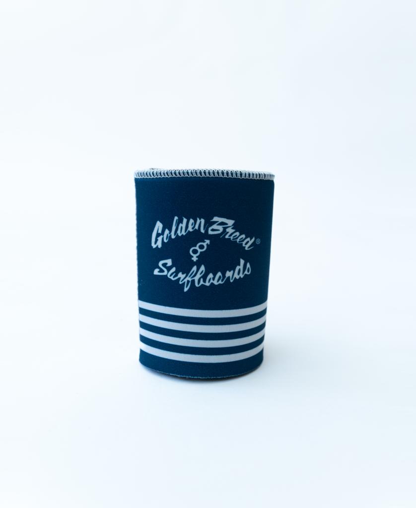 The Golden Breed Byron Stubby Beach Boy | Navy is a neoprene holder with white stripes and Golden Breed Surfboards text, perfect for keeping drinks cold in classic Byron Bay style. Stands upright against a plain white background.