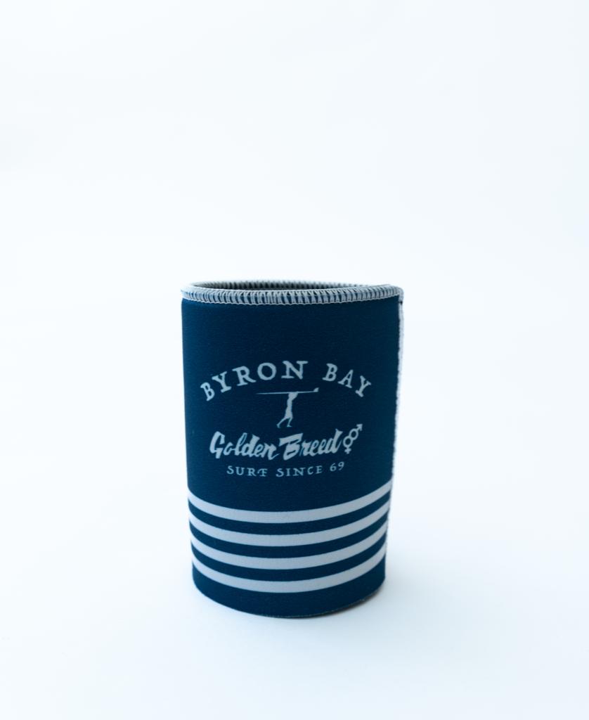 The Byron Stubby Beach Boy | Navy by Golden Breed is a navy neoprene holder featuring white stripes and Byron Bay Golden Breed Surf Since 69 printed on the front.