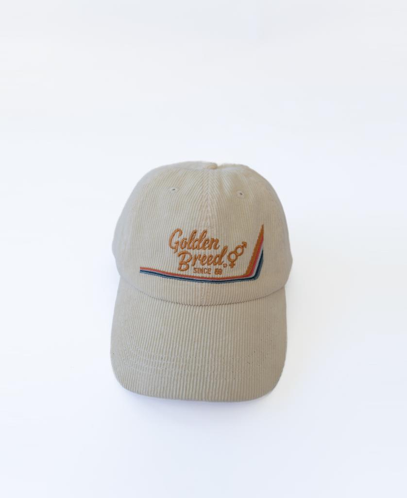 The Hancock Cord Cap | Off White by Golden Breed features classic corduroy style and a retro embroidered graphic on the front.