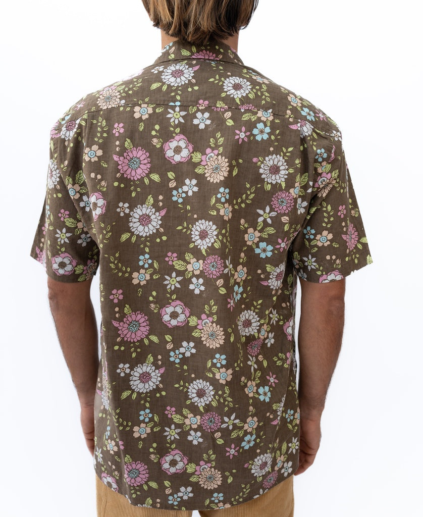 Someone is shown from the back wearing the Golden Breed Happy Floral Shirt in Wash Brown, featuring a colorful floral pattern, against a plain white background.