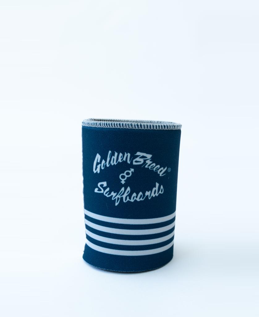A Noosa Stubby Beach Boy in navy by Golden Breed, featuring white stripes and Golden Breed Surfboards text, stands upright against a plain white background.