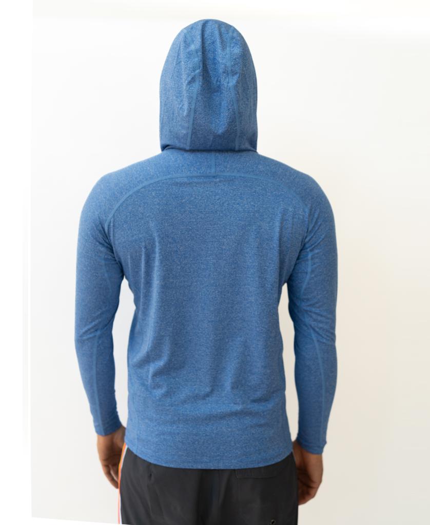 Someone stands facing away from the camera against a plain white background, wearing the Golden Breed Rapper Hoodie Rash Shirt in Blue Marle and black shorts.