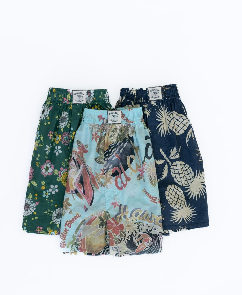 Three pairs of Golden Breed Tyson Boxer Shorts, including the Ivy Green style, are crafted from soft cotton poplin with signature floral and tropical prints.