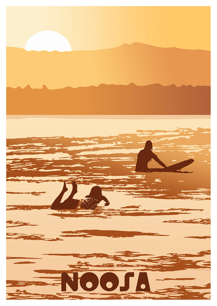 Two surfers in the water at sunset with mountains and sun behind them. Noosa appears at the bottom on Let Me Sea’s Postcard Golden Days, evoking vintage surf postcards and capturing classic summer waves photography.