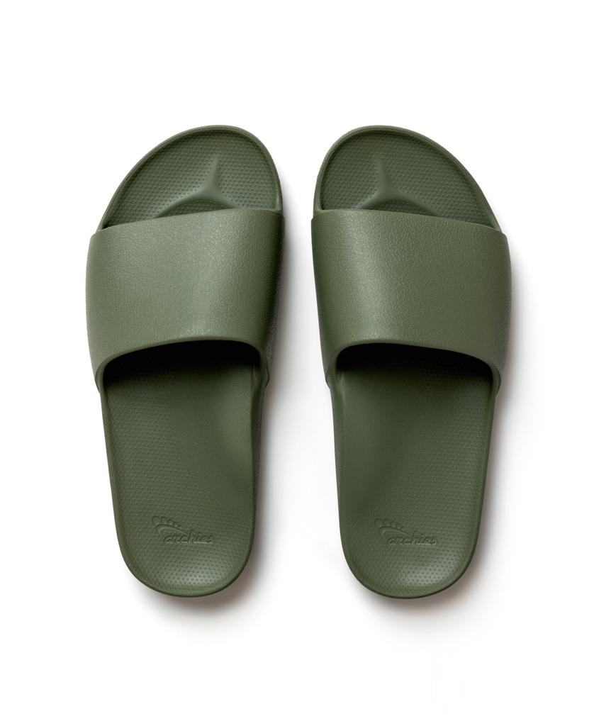 The Archies Archie Slide | Khaki is an olive green arch support slide with textured footbeds, crafted from closed cell foam that molds to your foot’s shape, shown from above on a white background.