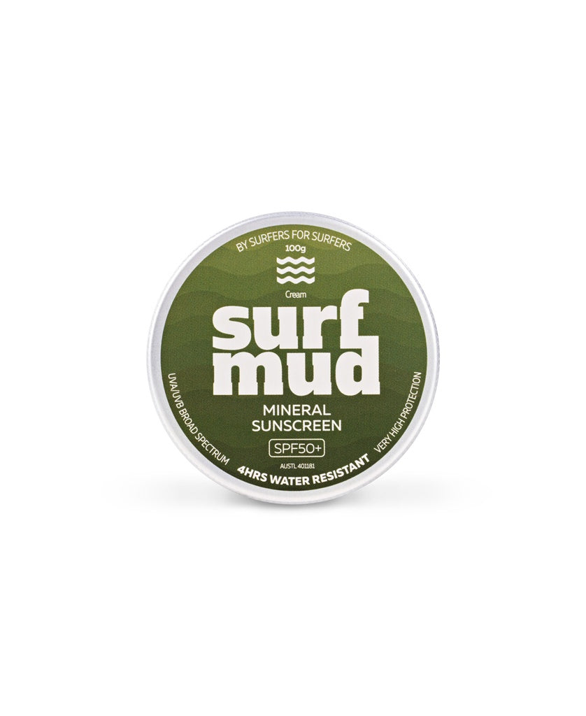 A round tin of Surf Mud Mineral Sunscreen SPF50+ with a green label, featuring non-nano zinc oxide for 4 hours water resistance and high sun protection.