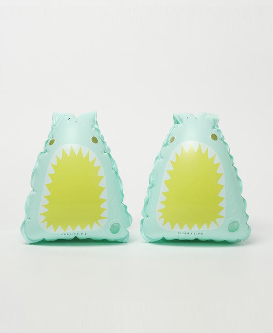 A pair of aqua Salty the Shark Float Bands by Sunny Life, featuring a playful shark face, perfect for building swimming abilities, set against a plain white background.