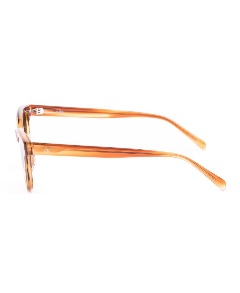 Side view of Sito Ryker eyeglass frames in Tangelo / Brown Polar, featuring rectangular, translucent orange plant-based acetate with thick arms, displayed against a white background.