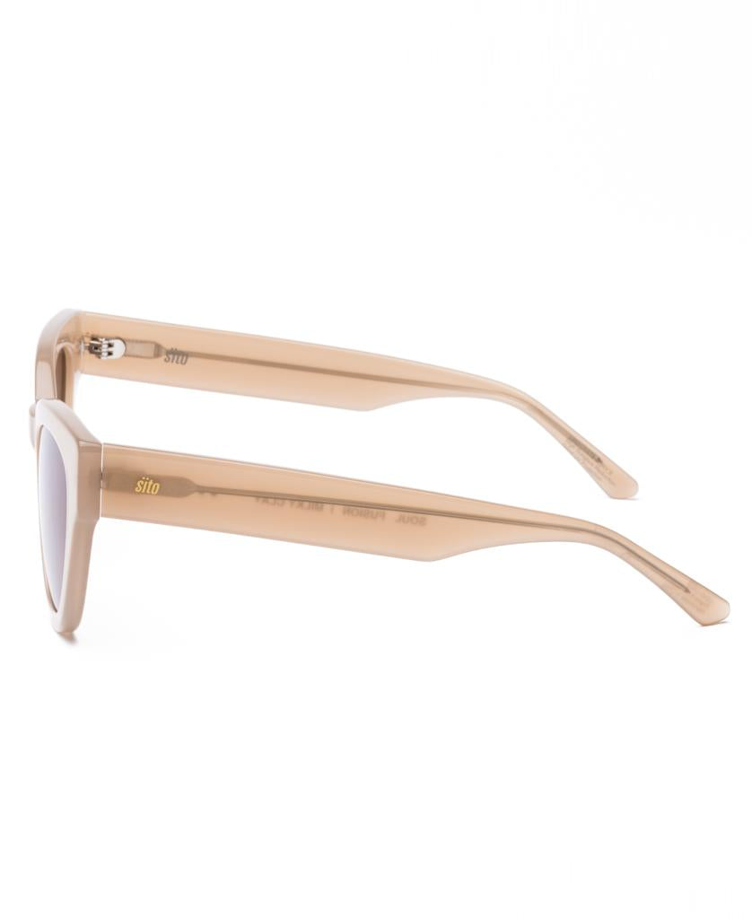 The Sito Soul Fusion sunglasses in Milky Clay/Coffee feature an oversized rectangular frame and tinted lenses, displayed from the side on a white background.