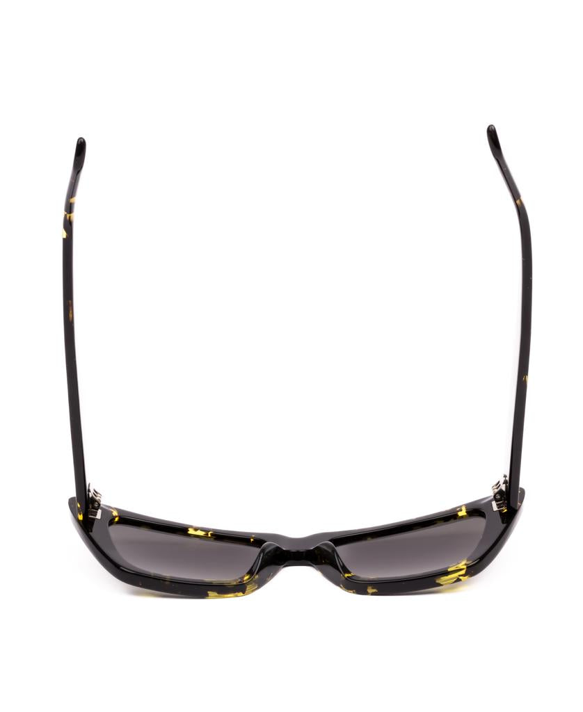 The Sito Wonderland sunglasses in Limeade Tort feature rectangular, plant-based acetate frames in black and yellow tortoiseshell with Horizon Gradient Polar lenses, shown open against a white background.