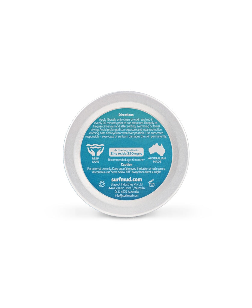 The SurfBaby Sensitive Sunscreen Tin SPF30 by Surf Mud is a round tin with a blue label showing directions, product info, and icons for SPF 30, reef safe, Australian made, and non-nano zinc oxide—ideal for sensitive skin.