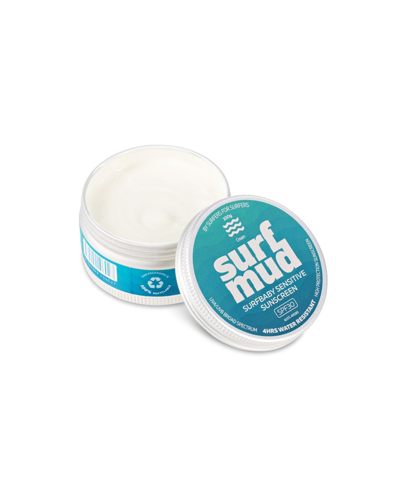 Open Surf Mud SurfBaby Sensitive Sunscreen Tin SPF30 with the lid beside it, showing the white mineral-based sunscreen made with non-nano zinc oxide inside.