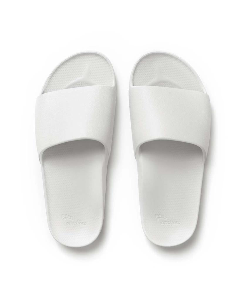 Archies Archie Slide in white, featuring wide straps and arch support, shown from above on a white background.