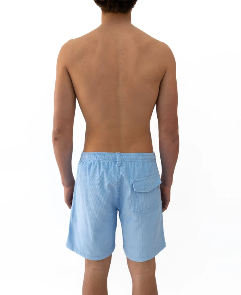 Back view of a shirtless man wearing light blue Floyd Cord Elastic Waist Walkshort | Blue Finch, featuring an elastic waistband and a rear pocket, suitable for surfwear and casual shop styles.