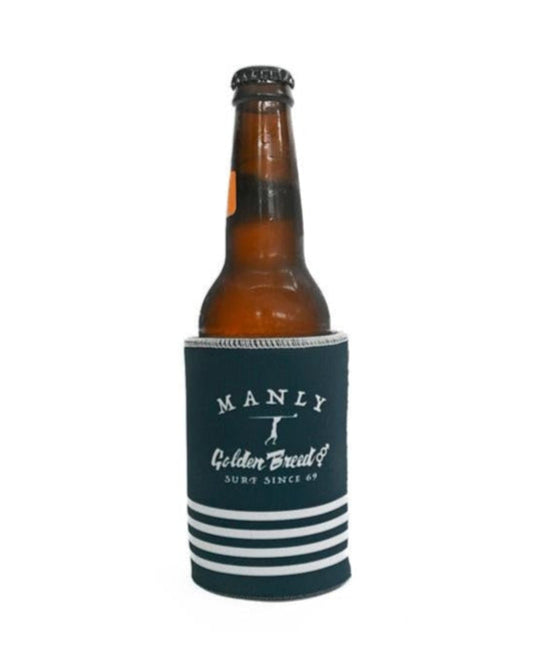 A brown glass beer bottle in the Manly Stubby Beach Boy | Navy neoprene holder by Golden Breed, featuring white stripes and a Manly Golden Breed Surf Since 69 label at the bottom.