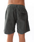 A person is shown from the back wearing Golden Breeds Floyd Elastic Waist Walkshort in wash black, featuring cotton corduroy fabric, an elastic waist, and a flap pocket on the right side.