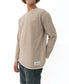 A person wears a Golden Breed Classic Rag Top in Coffee Marle, paired with dark shorts, standing against a plain white background.