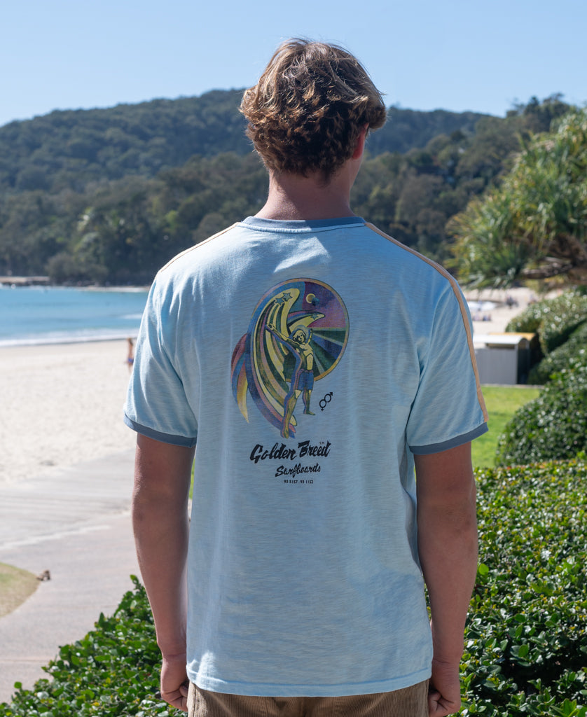 Golden Breed Flying Man Ringer Tee | Turquoise - T-Shirts