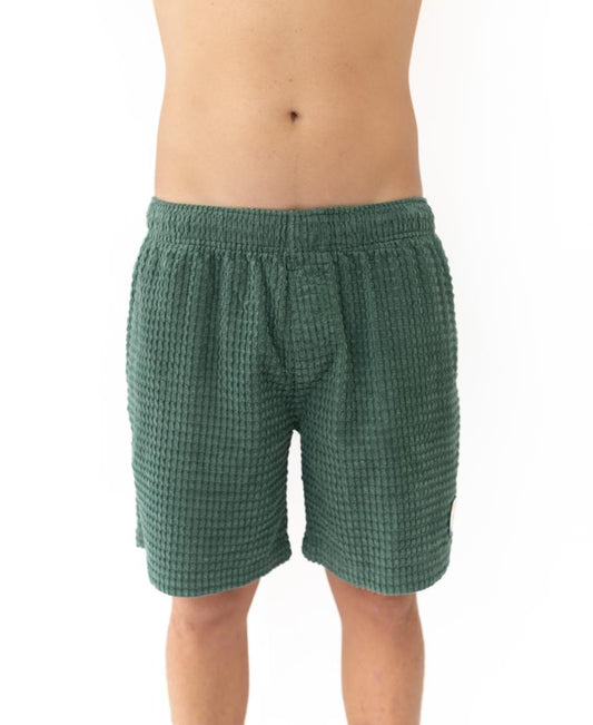 A person models the Golden Breed El Shorto Walkshort in Ivy Green, shown from the waist to above the knees against a plain white background.