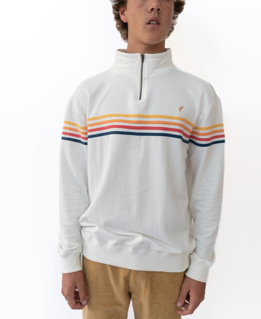 Someone wears the Golden Breed Long Island Fleecy Top in Off White—a bamboo/cotton/spandex quarter-zip pullover with orange, yellow, and blue stripes—paired with tan pants against a white background.