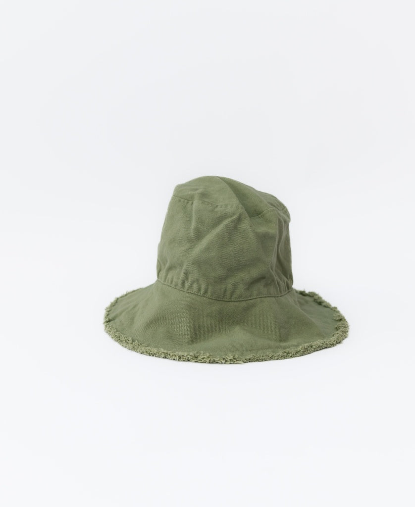 The Halo Bucket Hat | Olive by Lazy Beach is handmade in Indonesia from cotton, featuring a wide, slightly frayed brim. Shown here on a plain white background.