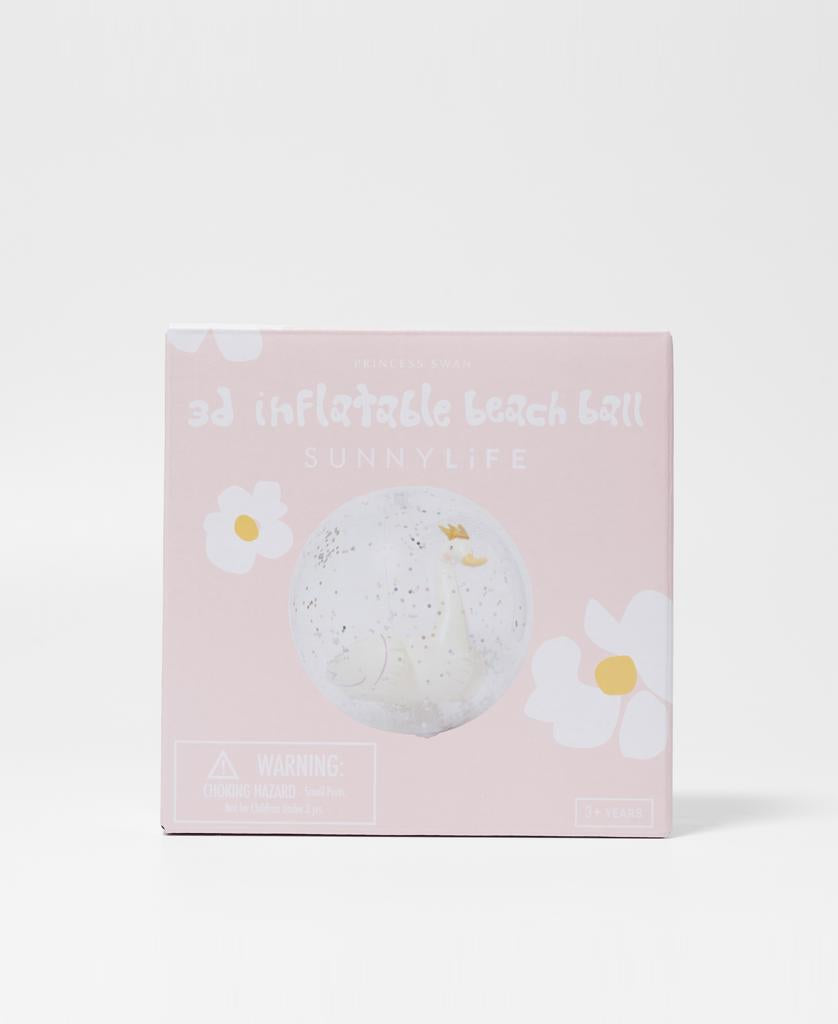 A pink box labeled 3D Inflatable Beach Ball Princess Swan by Sunny Life shows a clear ball with a swan inside and white flower designs—ideal for outdoor fun.
