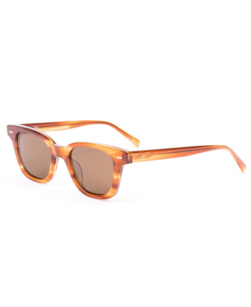 Sito Ryker sunglasses in Tangelo/Brown Polar feature rectangular lenses, a thick plant-based acetate frame, and reliable UV protection, shown against a white background.