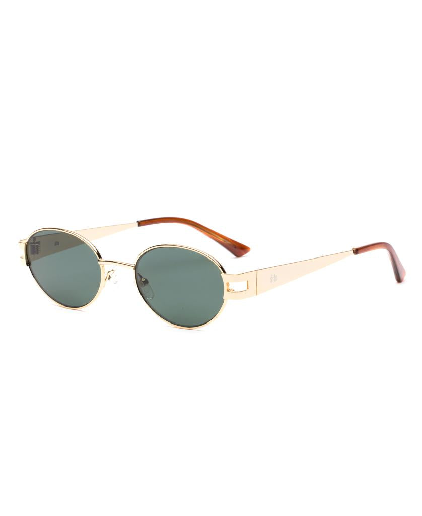 The Sito Stevie sunglasses feature a gold oval frame, Slate Polar green polarized lenses, and Tangelo brown temple tips, shown on a white background.
