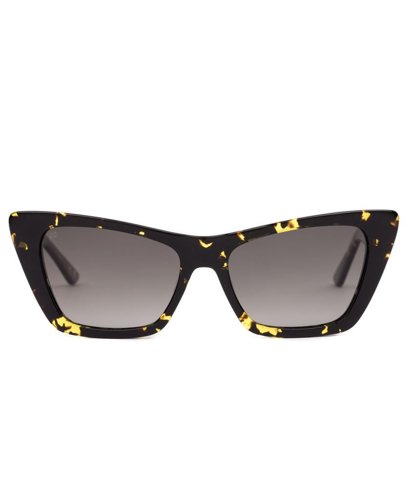 Sito Wonderland frames in Limeade Tort with a cat-eye shape, made from plant-based acetate and featuring Horizon Gradient Polar lenses, shown from the front on a white background.